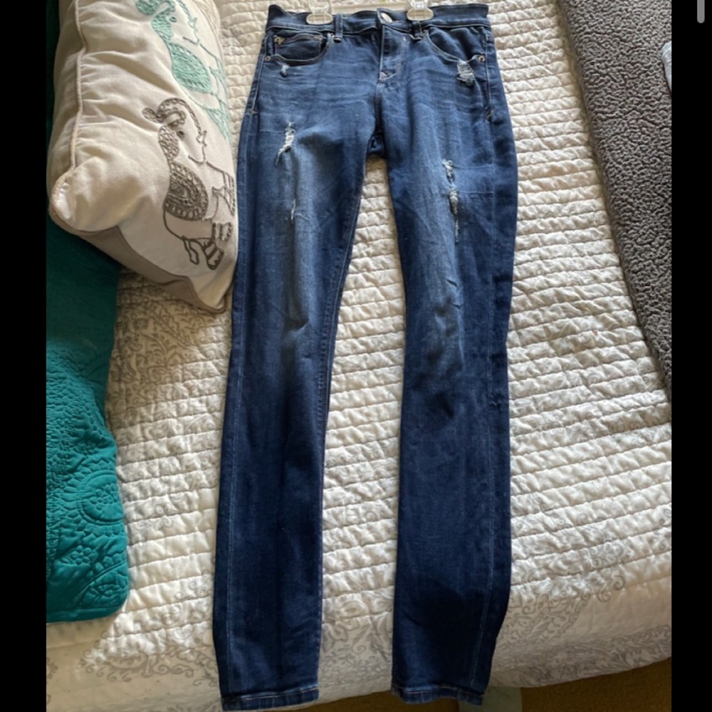 Express distressed skinny jeans